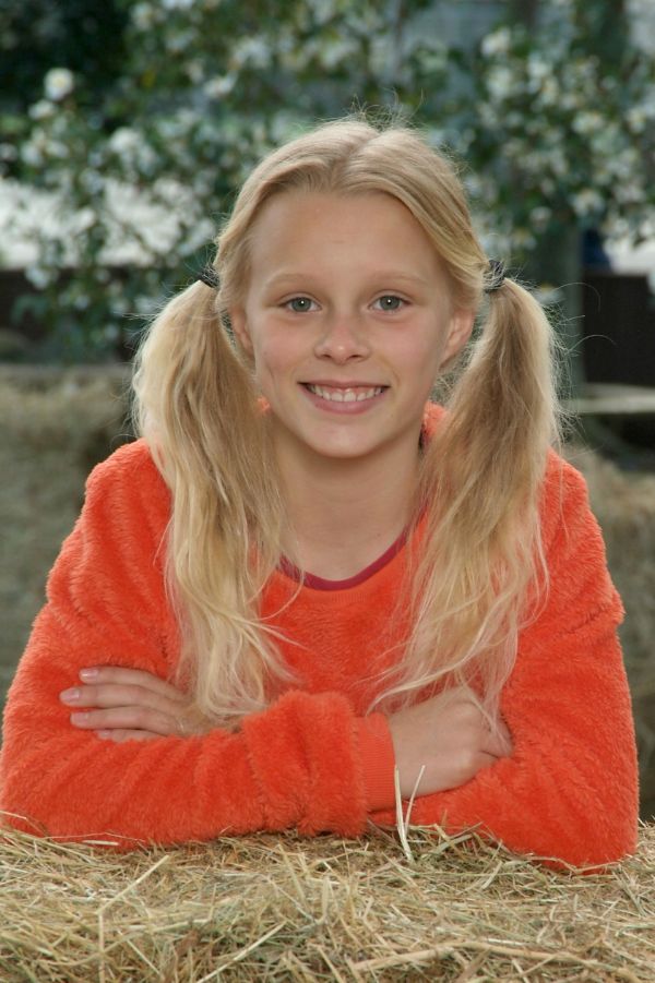 Portrait Images, Hay bails, Girl with orange shirt